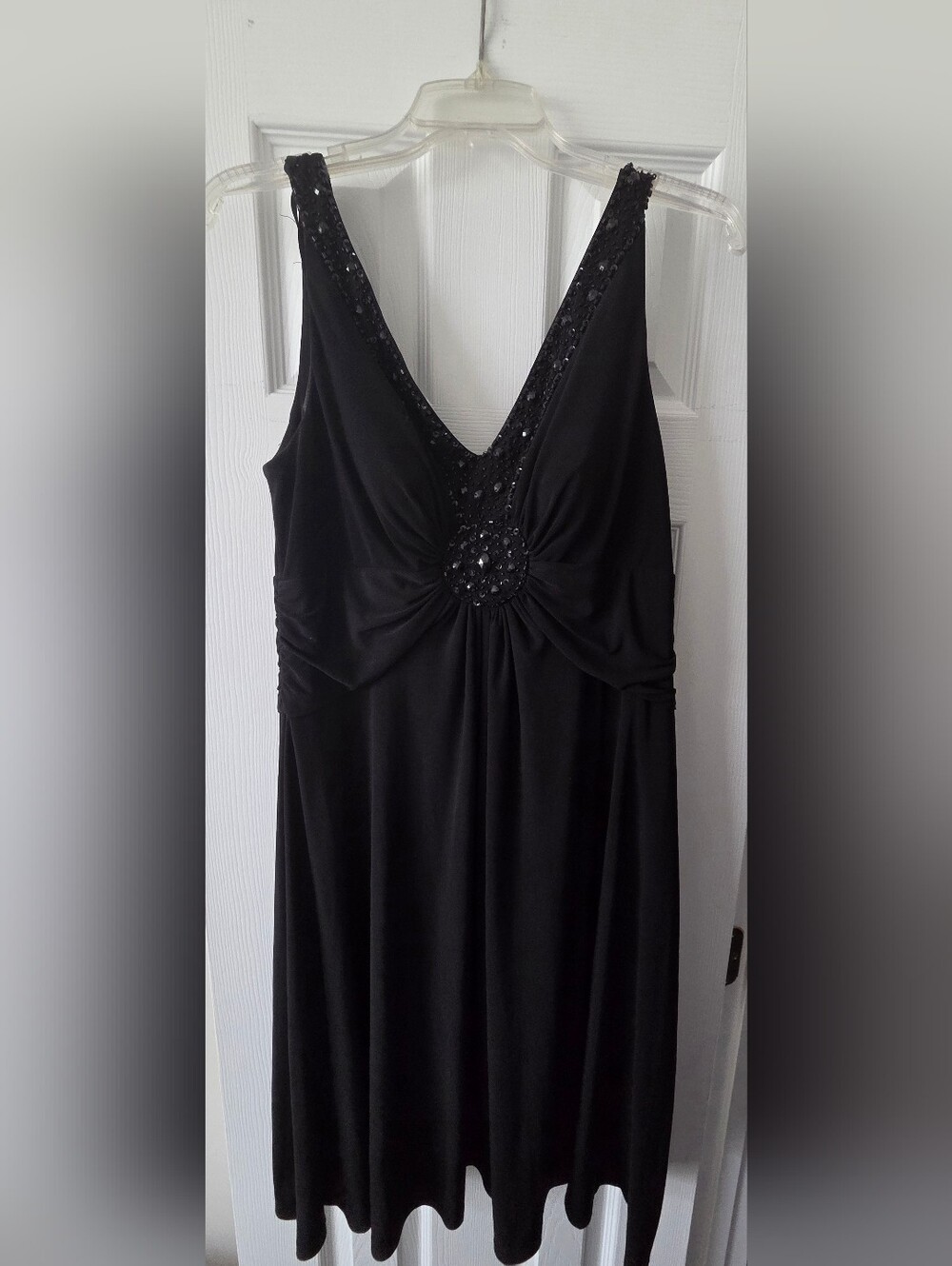 Black Sleeveless V-Neck Dress with Sequin Detail